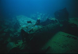 Japanese fighter aircraft in the#2 hole of the Fujikawa m... by Mike Ellis 
